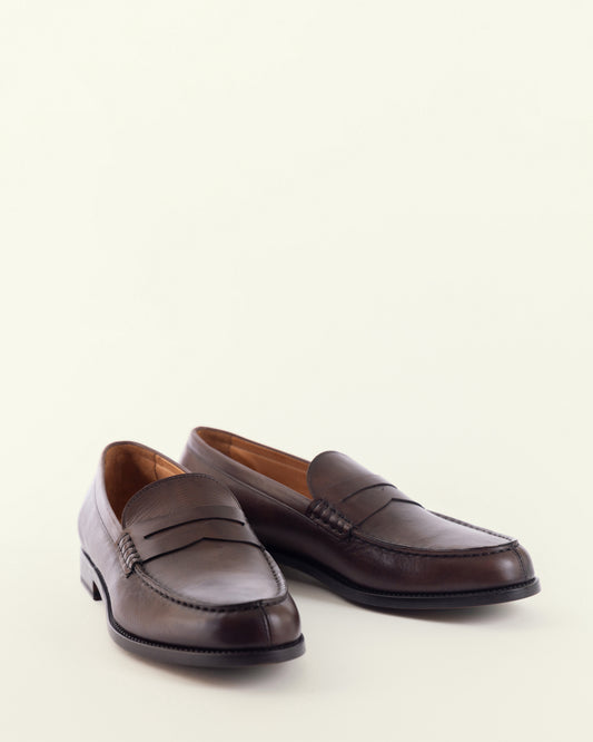 John Lajara testa di moro leather penny loafer, three-quarter front view on neutral background