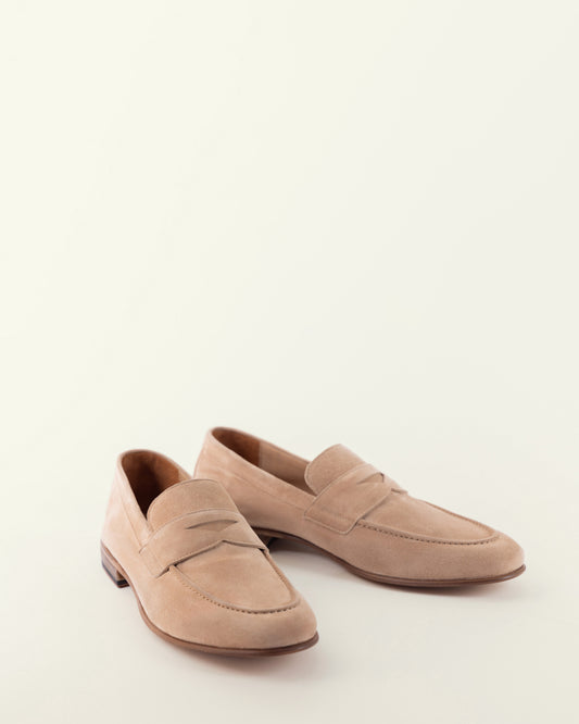 John Lajara sand kid suede penny loafer, three-quarter front view on neutral background
